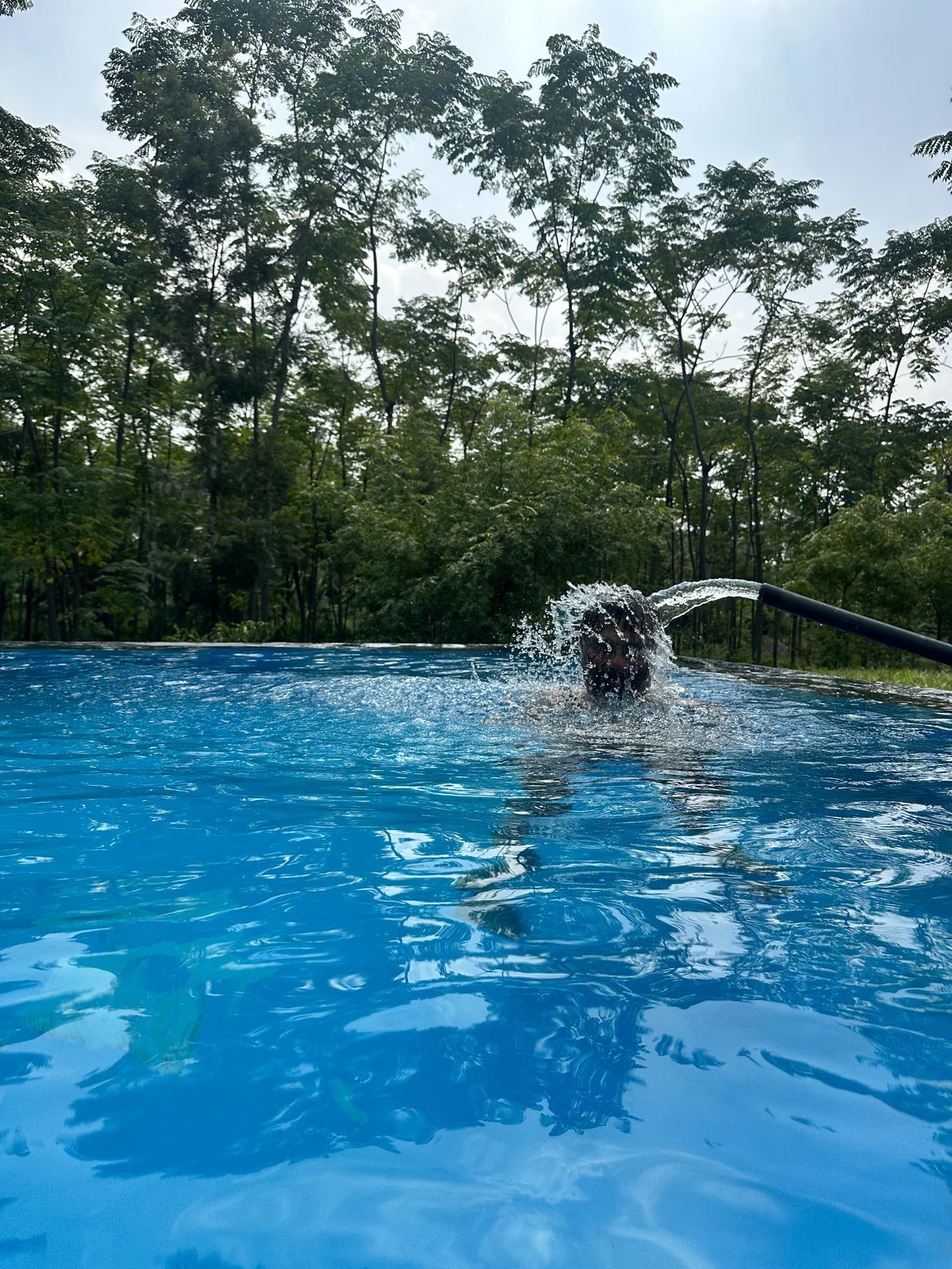 Pool with fountain stream